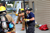 Firefighter Olson teaching EvCC